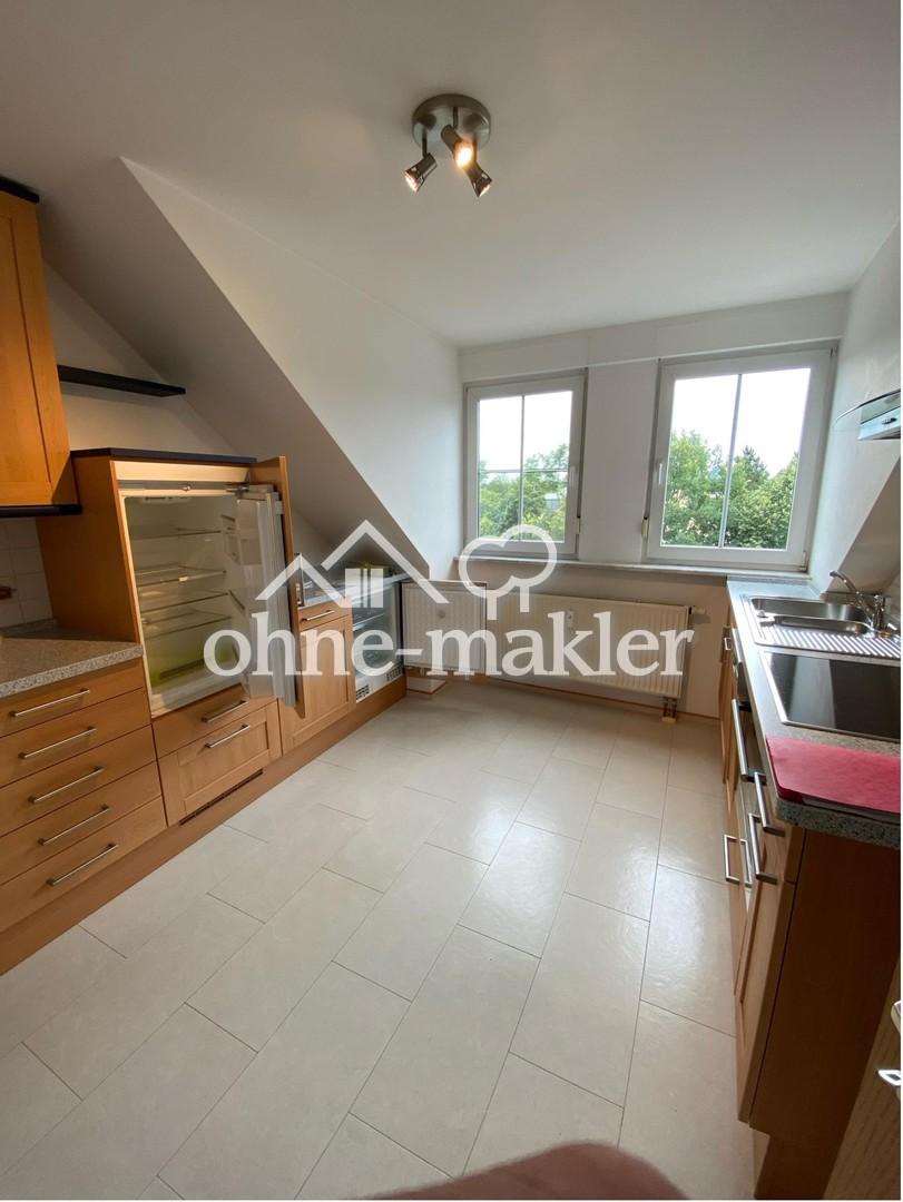 Helle 2-Zimmer-Dachgeschosswohnung mit Balkon und Stellplatz in zentraler Lage von Röthenbach - Foto 3