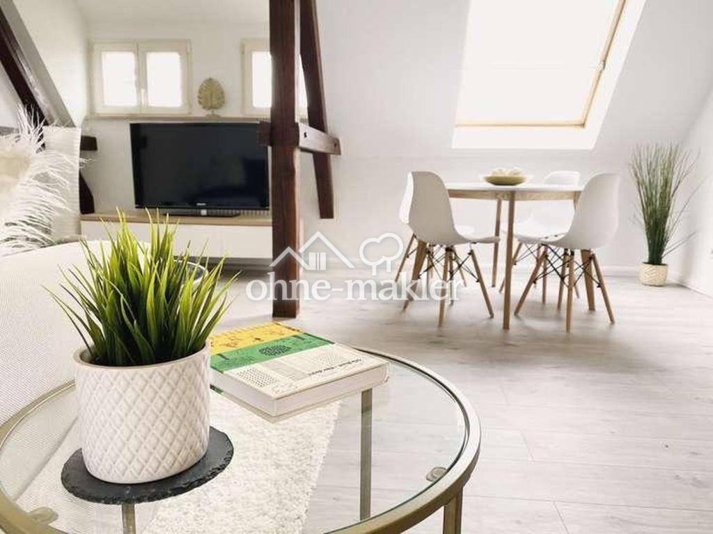 Helle 2-Zimmer-Dachgeschosswohnung mit Loggia & charmanten Holzbalken - Foto 3