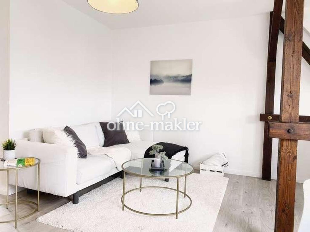 Helle 2-Zimmer-Dachgeschosswohnung mit Loggia & charmanten Holzbalken - Foto 2