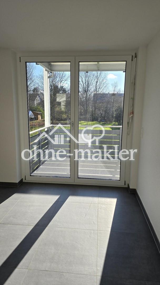 Moderne 2,5-Zimmer-Wohnung im KfW-55-EE-Standard – Stilvoll, Komfortabel und Energieeffizient - Photo 3