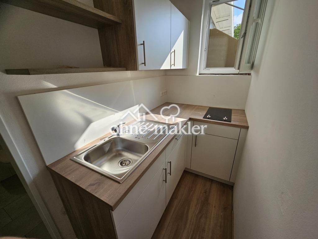 Charmante 1-Zimmer-Wohnung in zentraler Lage mit lichtdurchflutetem Wohnbereich - Photo 2