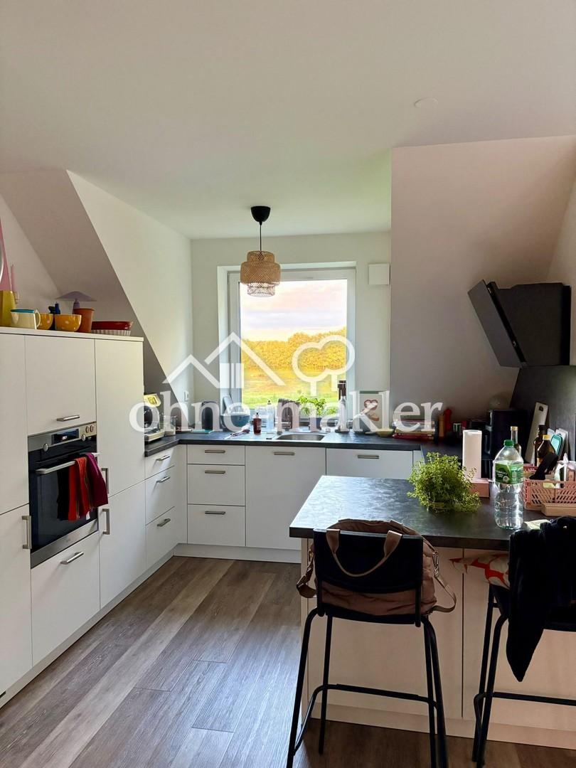 Helle DG-Wohnung an der "Schmalen Aue" mit freiem Blick in die Natur - Foto 4