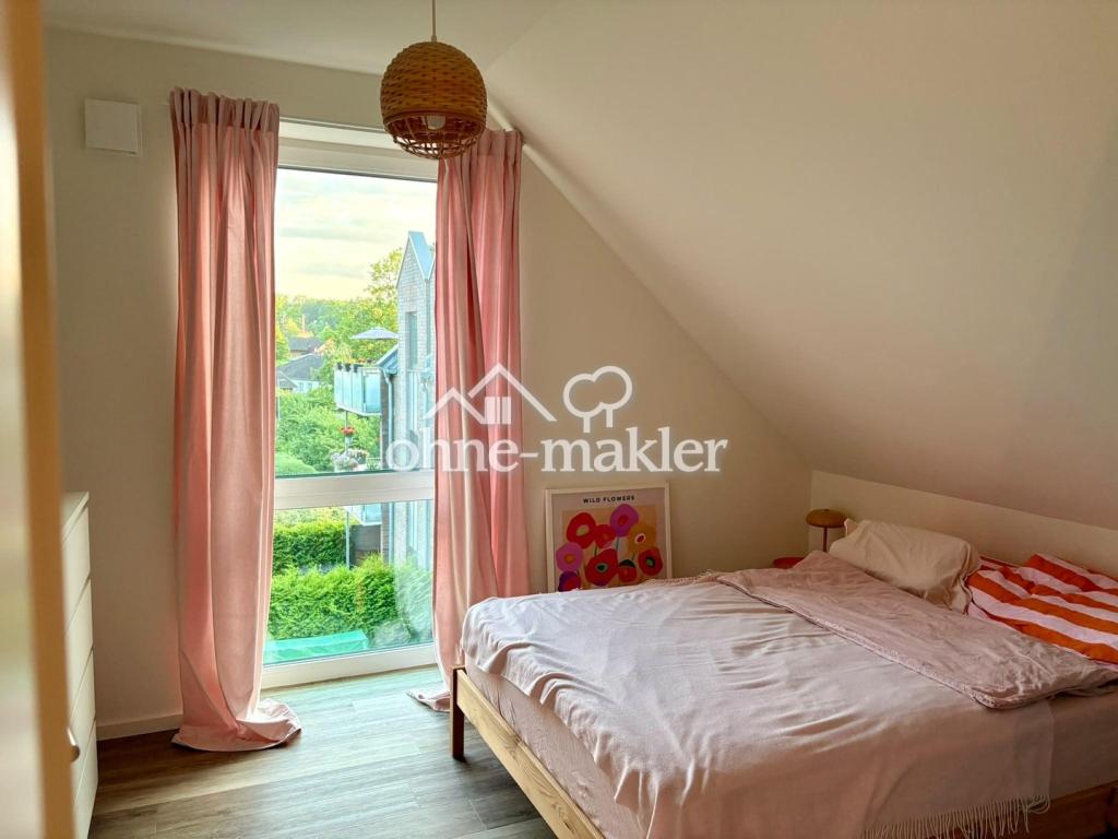 Helle DG-Wohnung an der "Schmalen Aue" mit freiem Blick in die Natur - Foto 3