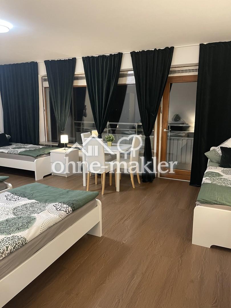 4-Bett-Zimmer mit Sitzecke