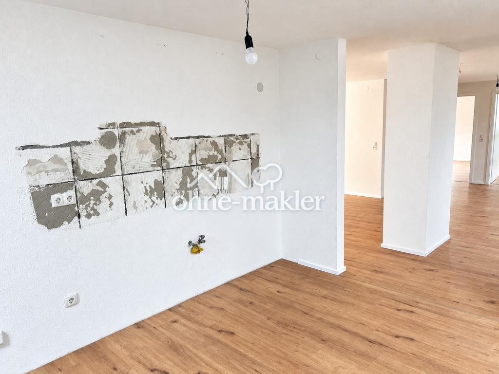 Sanierte Maisonette-Wohnung mit großzügigem Wohnbereich, hochwertiger Küche & Balkon - Foto 2