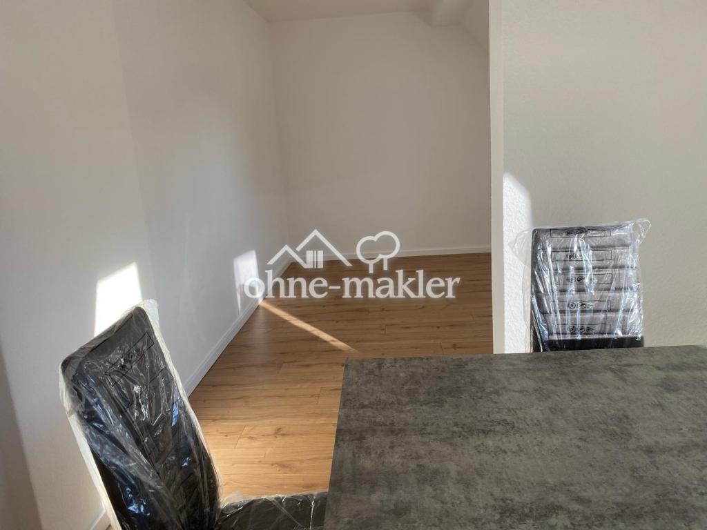 Renovierte Dachgeschosswohnung in ruhiger Lage - Photo 2