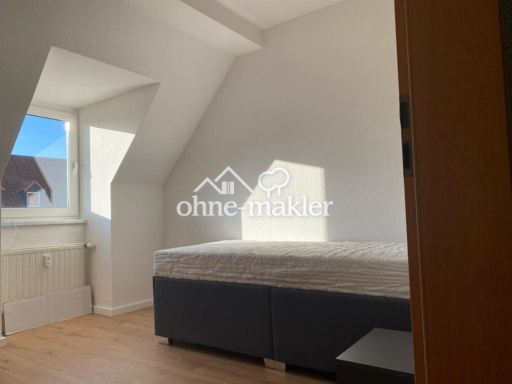 Renovierte Dachgeschosswohnung in ruhiger Lage - Foto 4