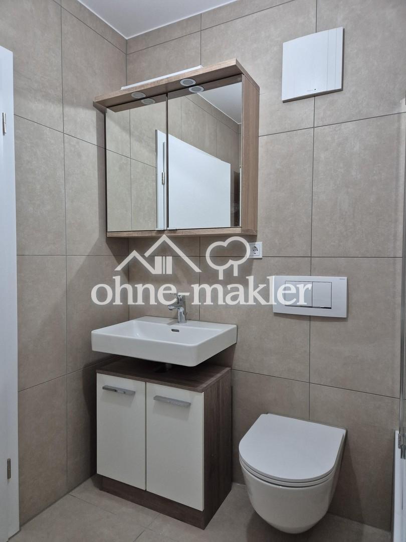 Moderne 1-Zi-Wohnung mit großzügiger Küche und Tiefgaragenplatz in LU a.R. - Foto 5