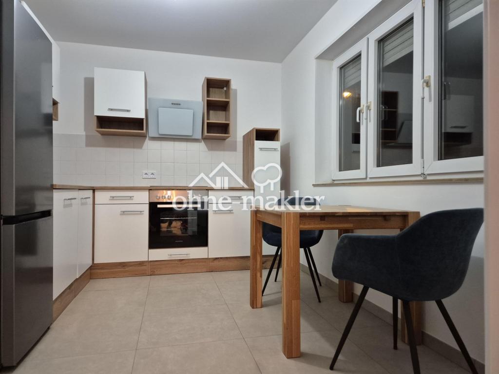 Moderne 1-Zi-Wohnung mit großzügiger Küche und Tiefgaragenplatz in LU a.R. - Foto 3
