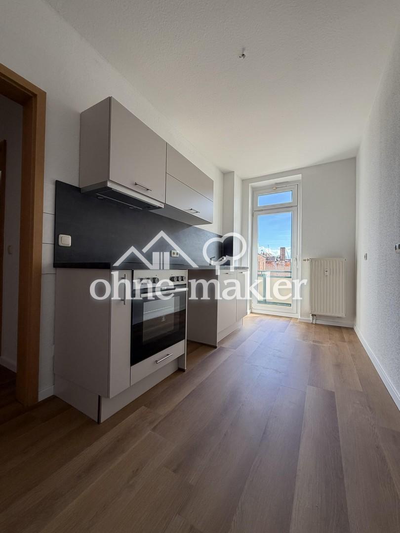 Sonnenglück - sonnige 2-Raum-Wohnung mit neuer Küche und Balkon - Foto 1