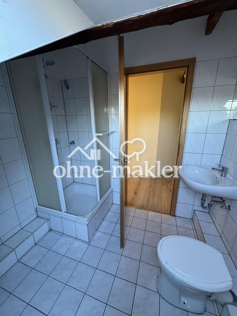 Gemütliche Dachgeschosswohnung mit Einbauküche - Foto 5