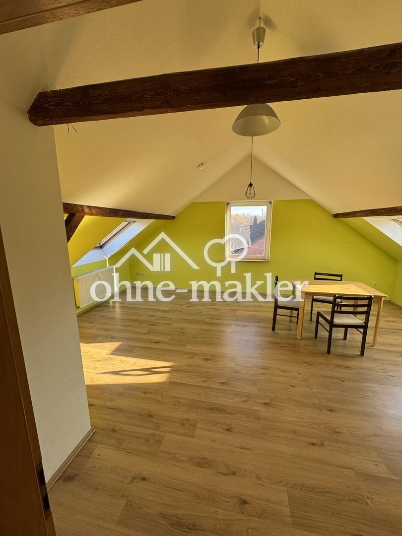 Gemütliche Dachgeschosswohnung mit Einbauküche - Foto 1
