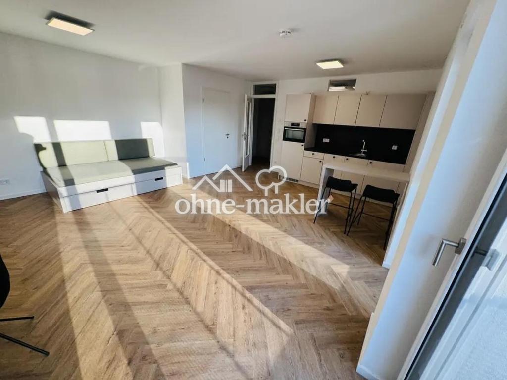 Neubau! 1-Zimmer möbliert mit EBK + Balkon + Abstellkammer + Waschmaschinenanschluss in Adlershof! - Foto 1