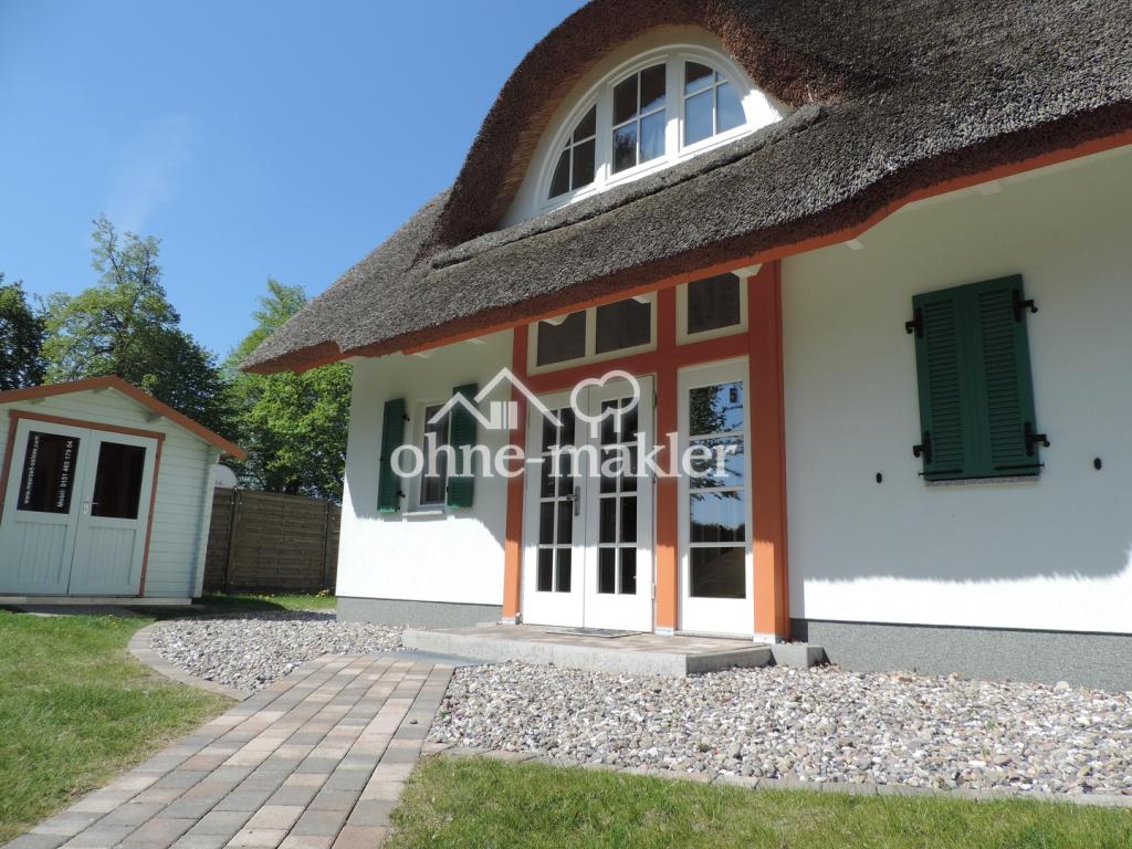 Eingang und Gartenhaus