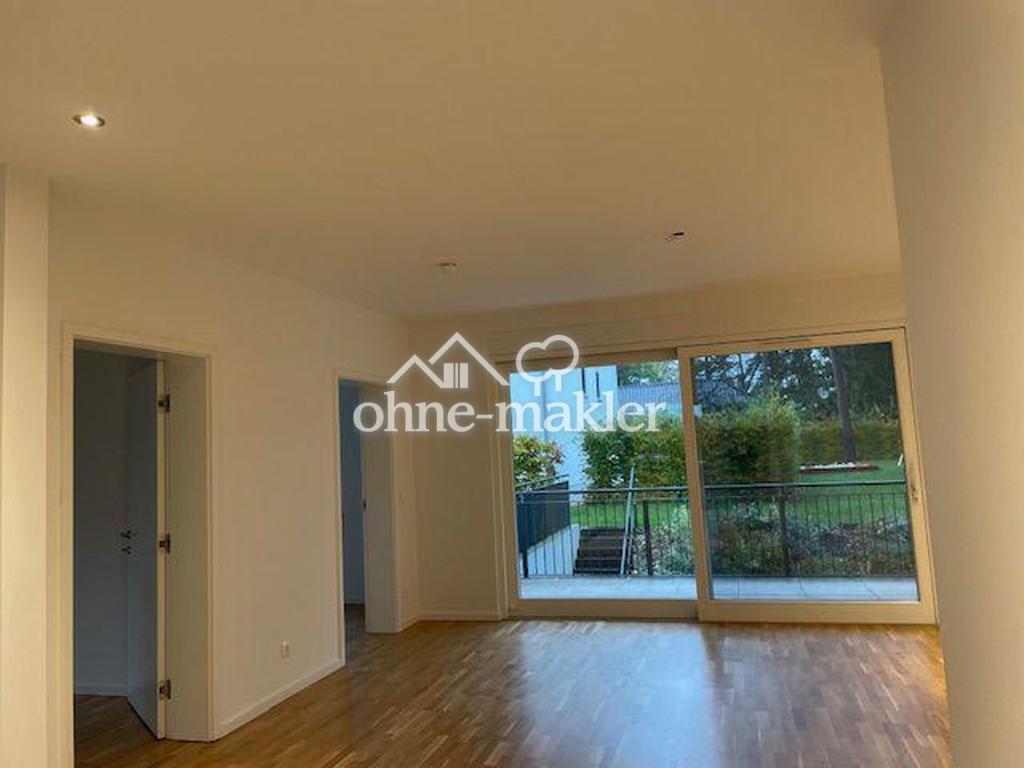 Wohnen am See in der Natur: Moderne Wohnung mit Terrasse und Garten - Photo 1