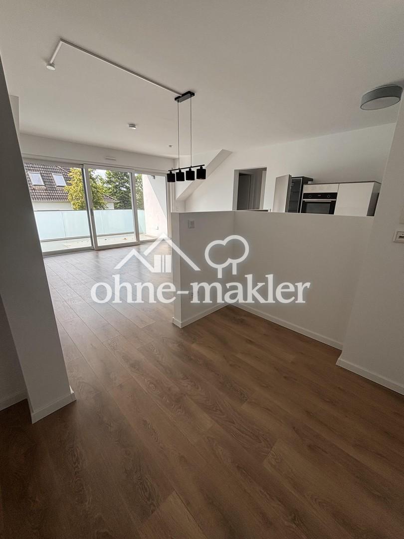 Elegante und energieeffiziente Dachgeschosswohnung (KfW40) - 3 Zimmer - Foto 1