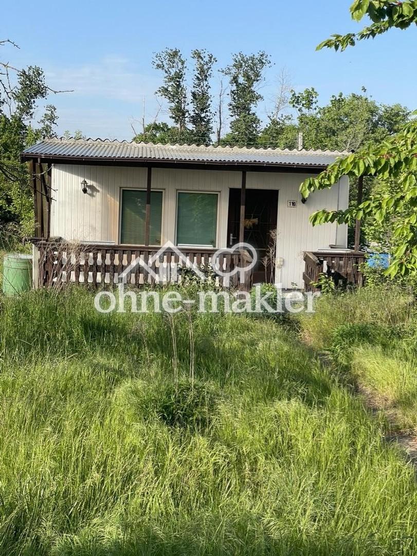 Gartenhaus + Grundstück