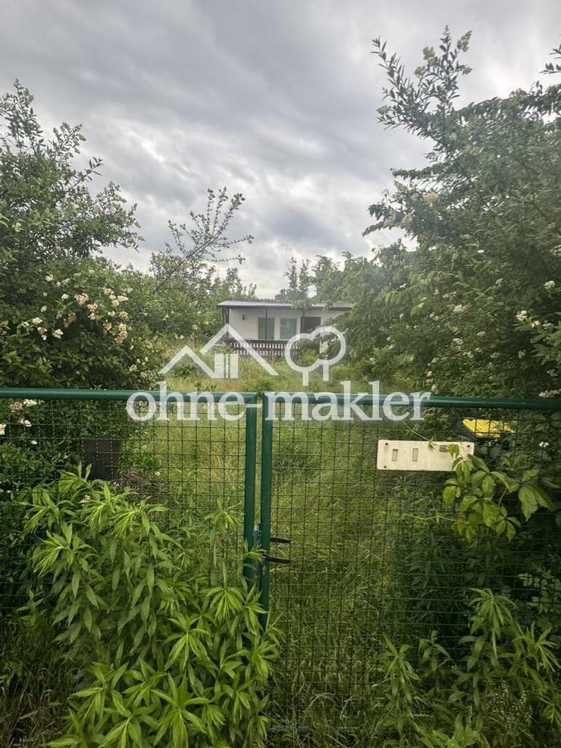 Gartenhaus + Grundstück