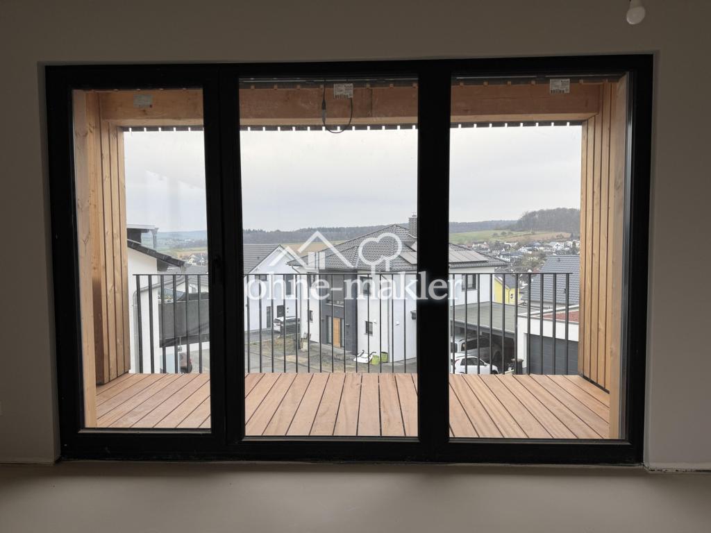 Schlafzimmer mit Balkonblick