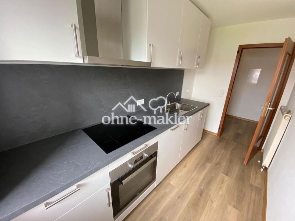 Renovierte 3-Zimmerwohnung mit neuer EBK, Südbalkon + Stellplatz in angenehmer Lage von Kirrlach! - Photo 2