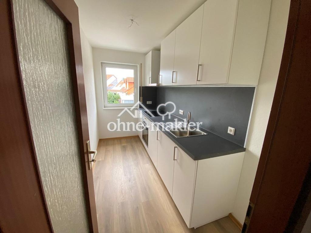 Renovierte 3-Zimmerwohnung mit neuer EBK, Südbalkon + Stellplatz in angenehmer Lage von Kirrlach! - Photo 3