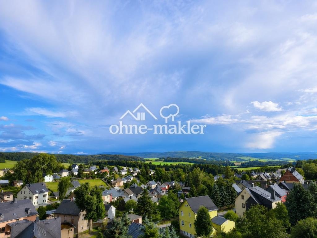 Elterlein: Sonnige 3-Zimmer-DG-Wohnung mit Kamin und Einbauküche in ruhiger Neubauanlage - Foto 4
