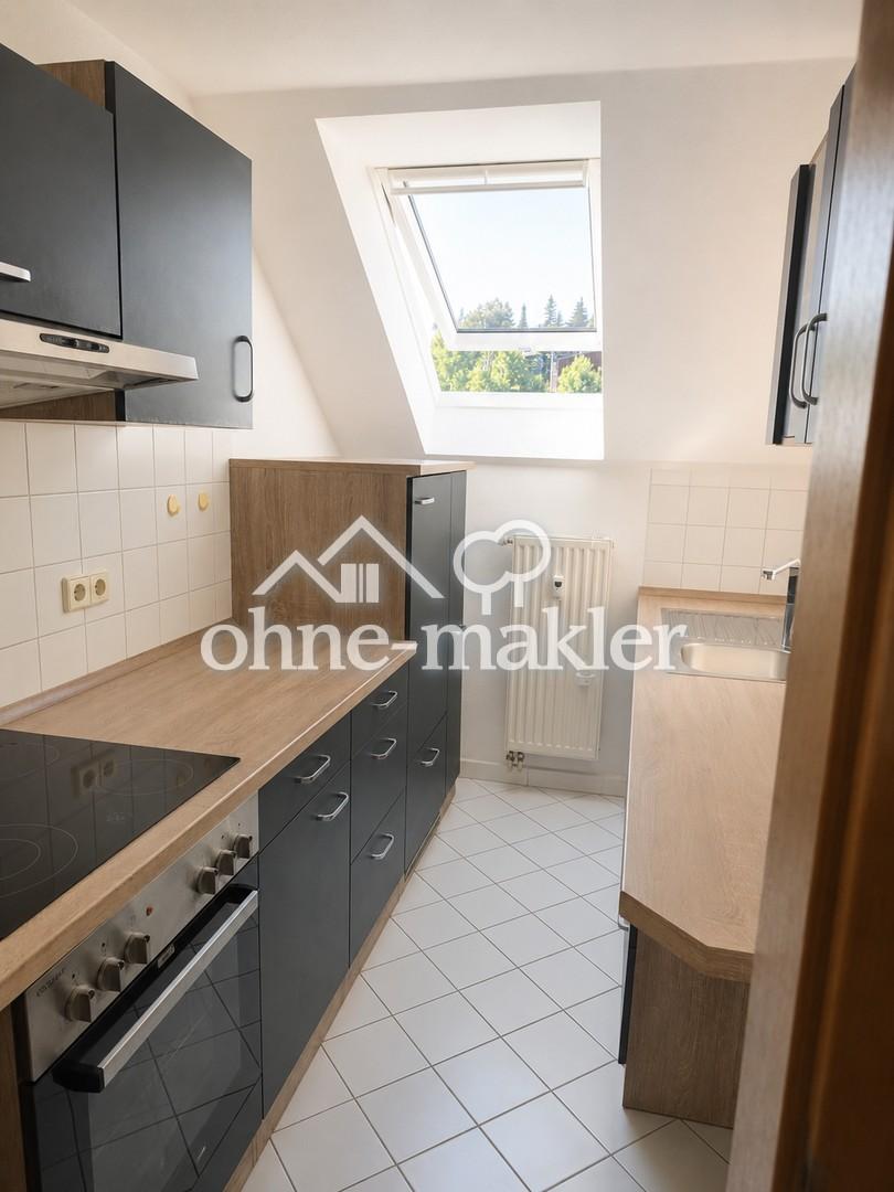 Elterlein: Sonnige 3-Zimmer-DG-Wohnung mit Kamin und Einbauküche in ruhiger Neubauanlage - Photo 2