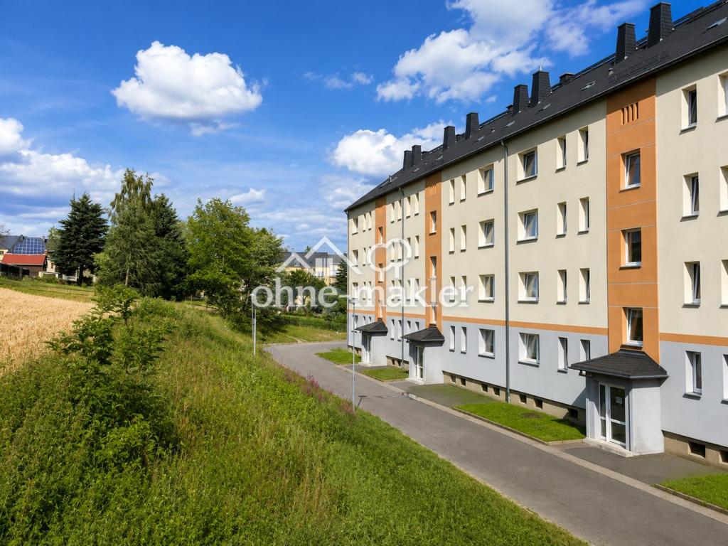 Elterlein: Sonnige 3-Zimmer-DG-Wohnung mit Kamin und Einbauküche in ruhiger Neubauanlage - Photo 4