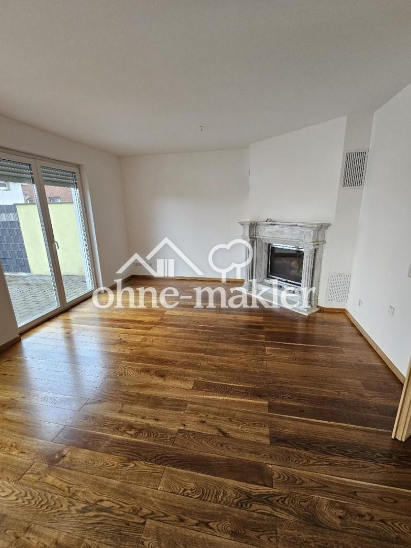 Wohnzimmer mit Kamin
