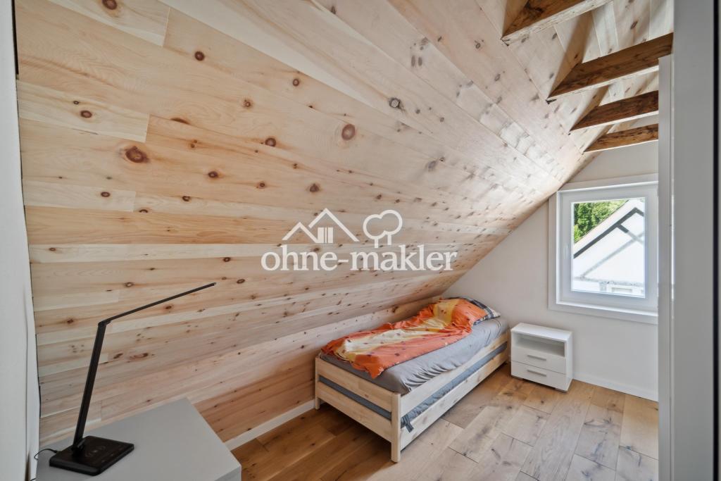 Schlaffzimmer unter dem Dach