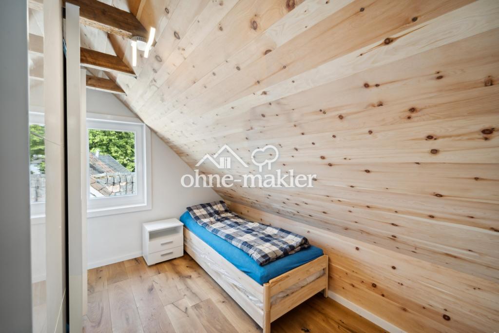 Schlaffzimmer unter dem Dach