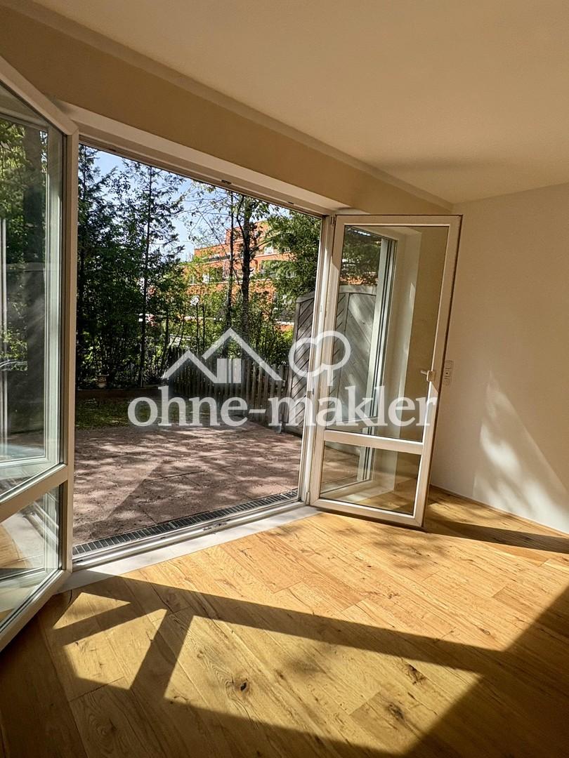 Gartenwohnung mit Reihenhauscharakter - Oase inmitten der Stadt - Foto 2