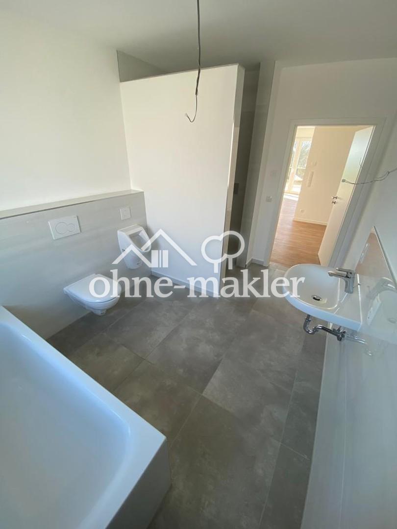 Moderne 3-Zimmer- Wohnung mit Tiefgaragenstellplatz & Balkon - Neubau aus 2022 - Foto 4