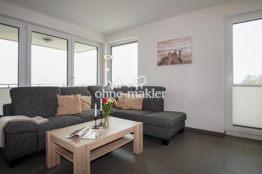 Wohnzimmer mit L-Sofa