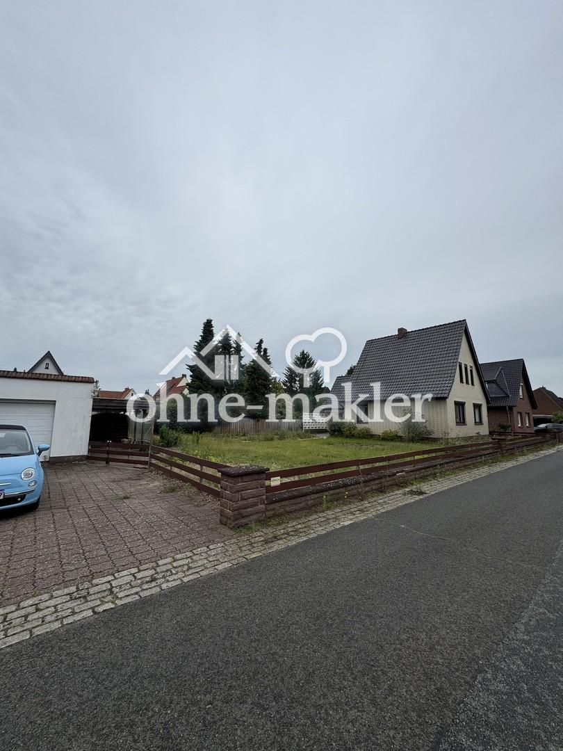 Haus + Baugrundstück + Garage