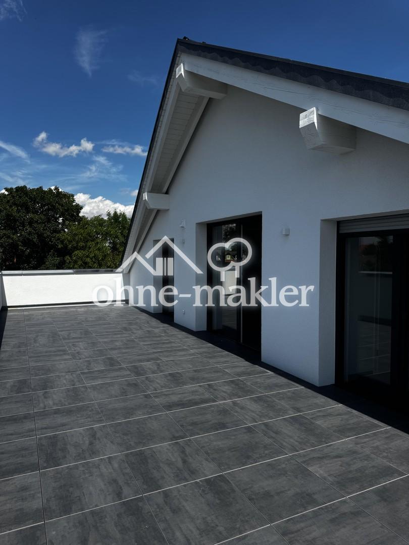 Wohnen mit Stil: Penthouse-Wohnen im Grünen – 4-Zimmer-Dachgeschosswohnung mit ca. 144 m² - Photo 5