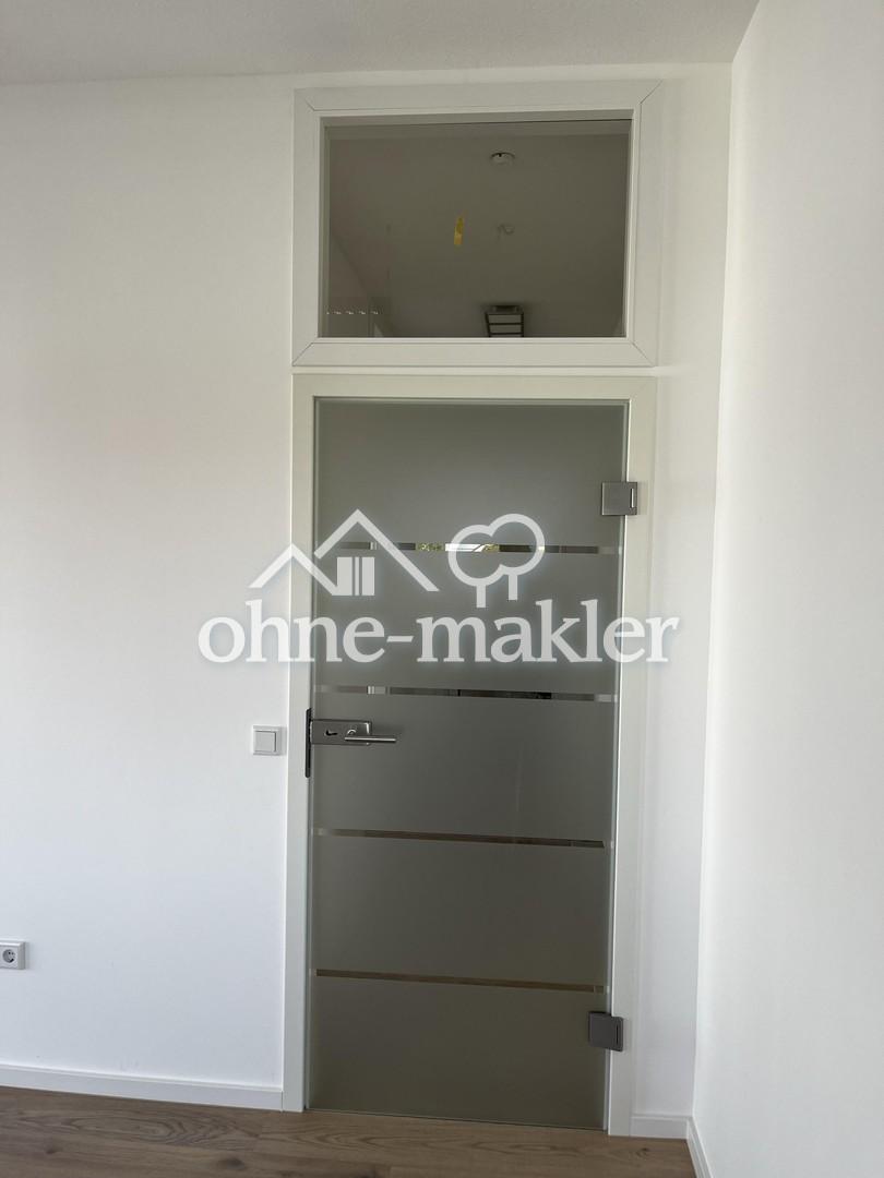 Glastüre mit Oberlichte