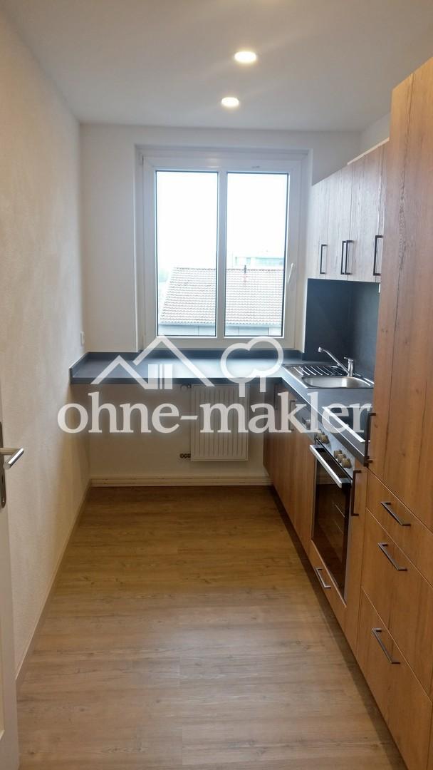 renovierte 2-Zimmer Wohnung im 2. OG mit EBK, KFZ-Stellplatz und Kellerabteil - Photo 2