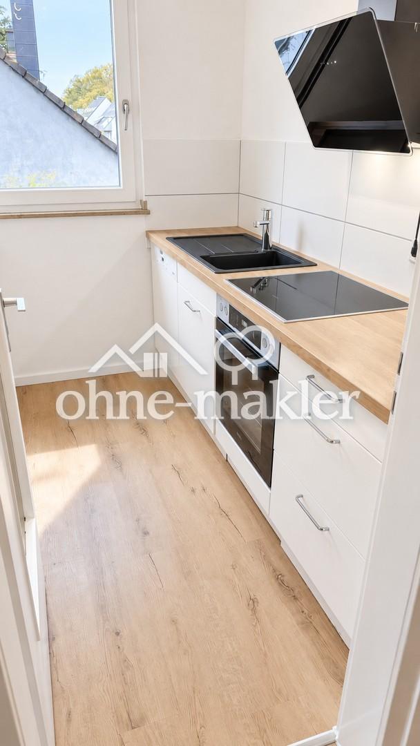 2-Zimmer-Wohnung in Düsseldorf-Unterbach mit Einbauküche in ruhiger Lage - Foto 1