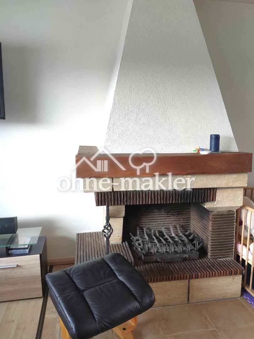 Wohnzimmer m. offenem Kamin