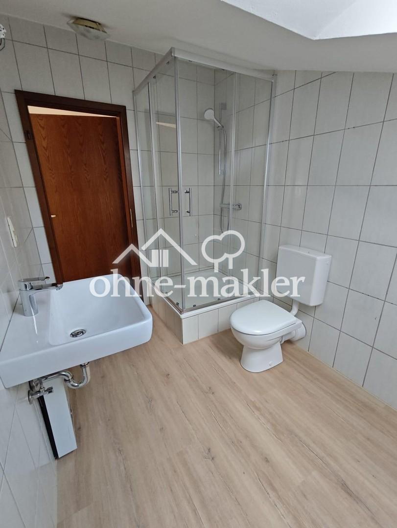 Renovierte 2-Zimmer-DG-Wohnung mit hochwertiger Einbauküche in zentraler Lage von Iserlohn - Photo 3