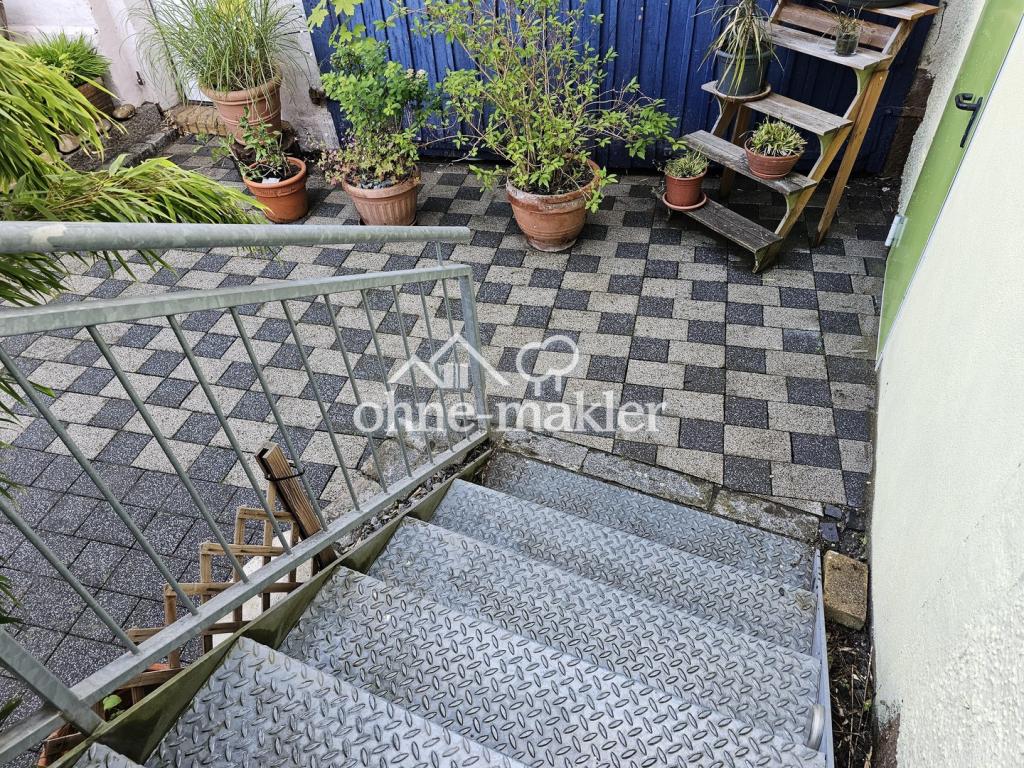 Vom Balkon in den Hof