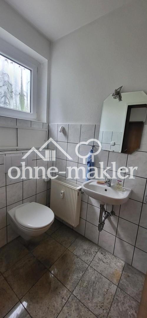 Gäste-WC Wohnung re. 