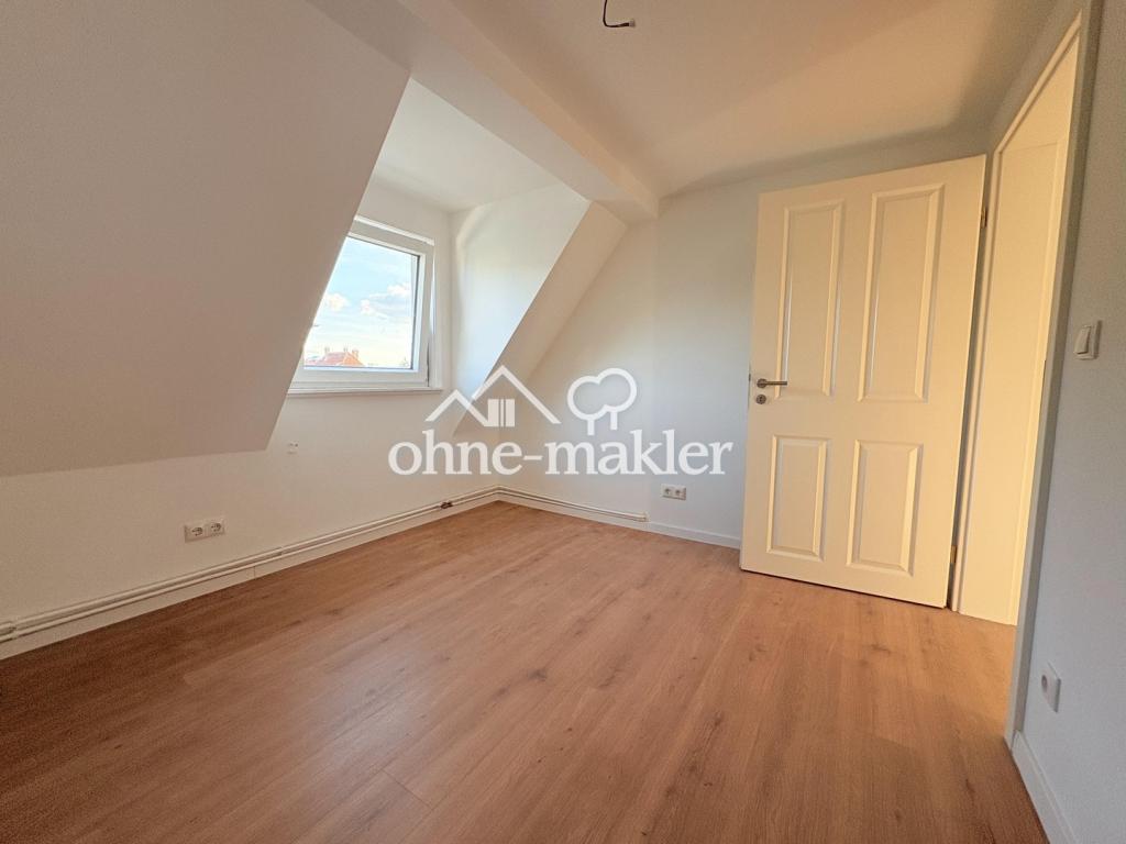 Kernsanierte, helle DG-Wohnung - Foto 1