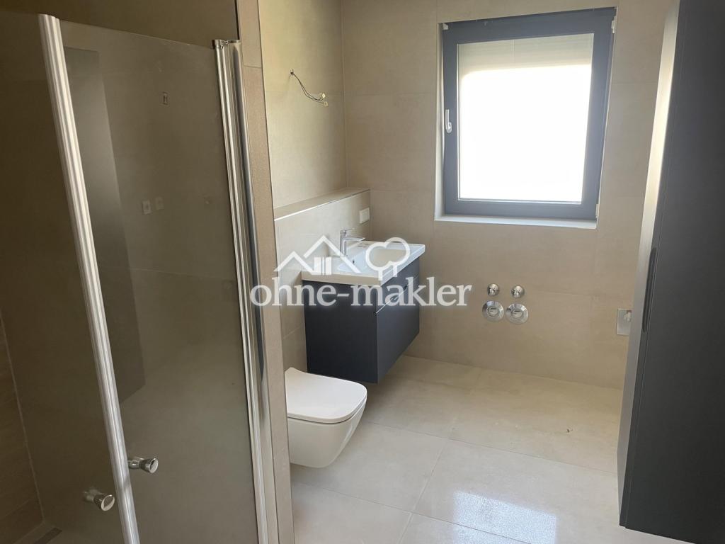 Neubau 3 Zimmer direkte Feldrandlage - Foto 2