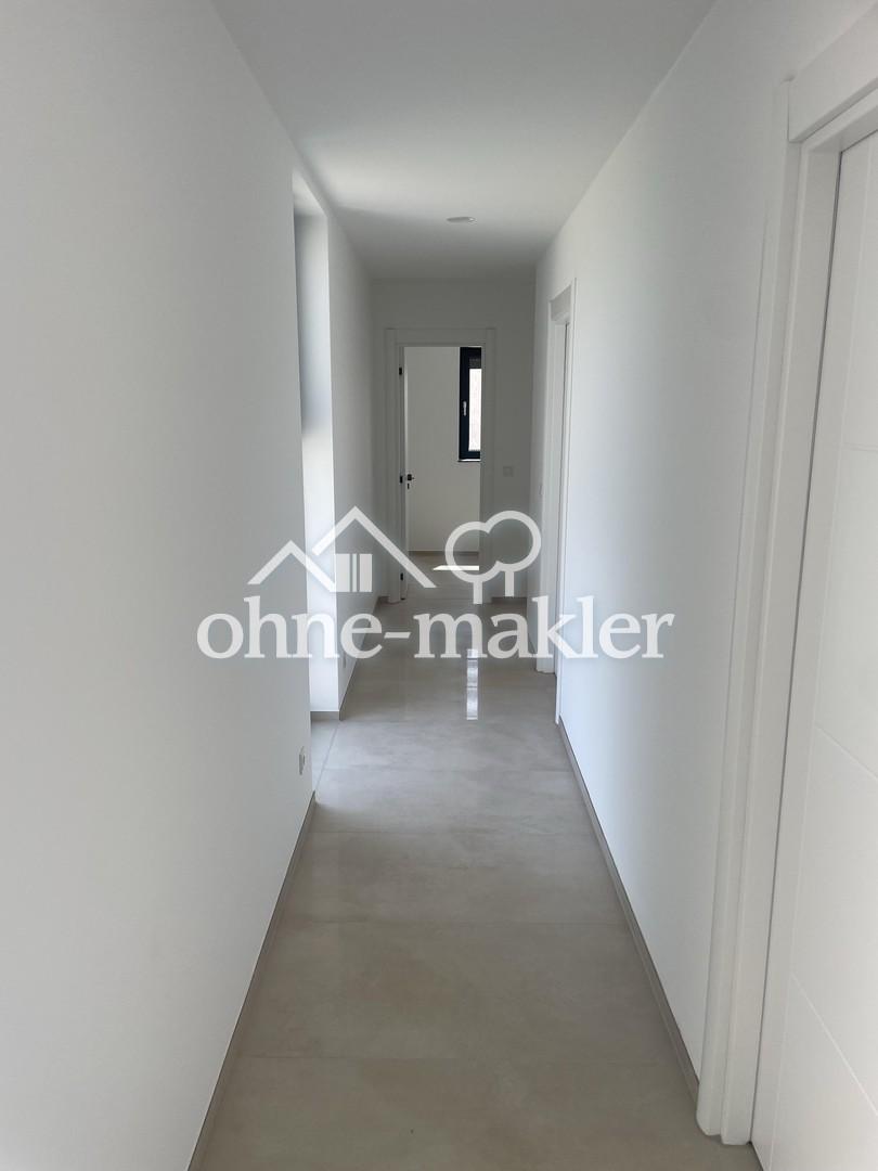 Neubau 3 Zimmer direkte Feldrandlage - Foto 3