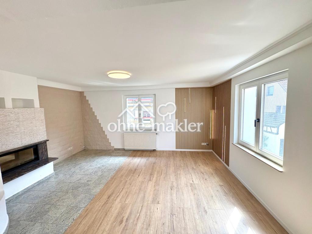 Wohnzimmer mit Kamin