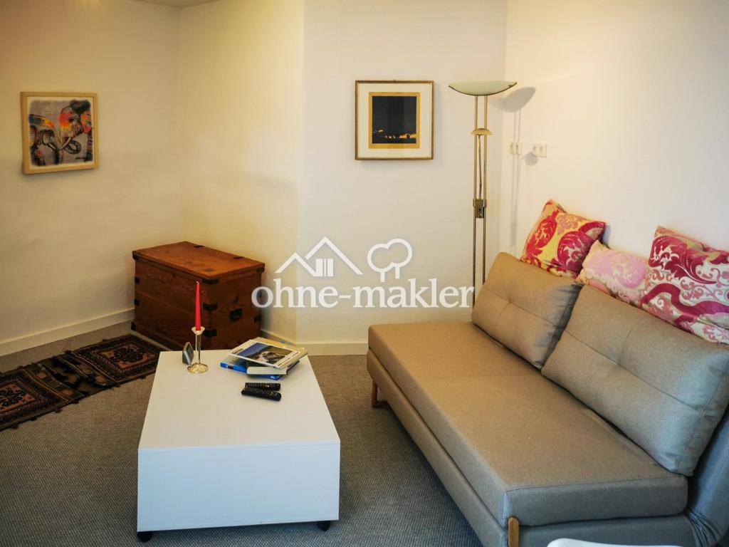 Wohnzimmer mit Schlafsofa