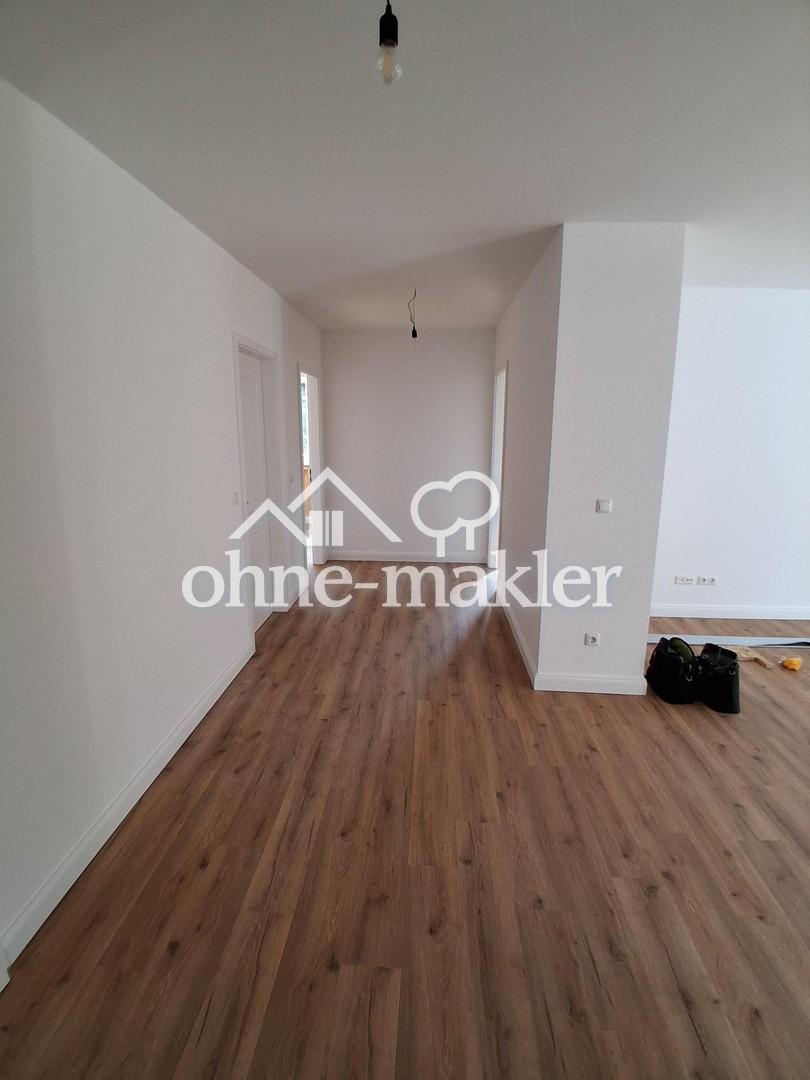 Schöne neu errichtete 3 bis 4 Zimmer-Dachgeschosswohnung mit geh. Innenausstattung und Dachterrasse - Foto 1