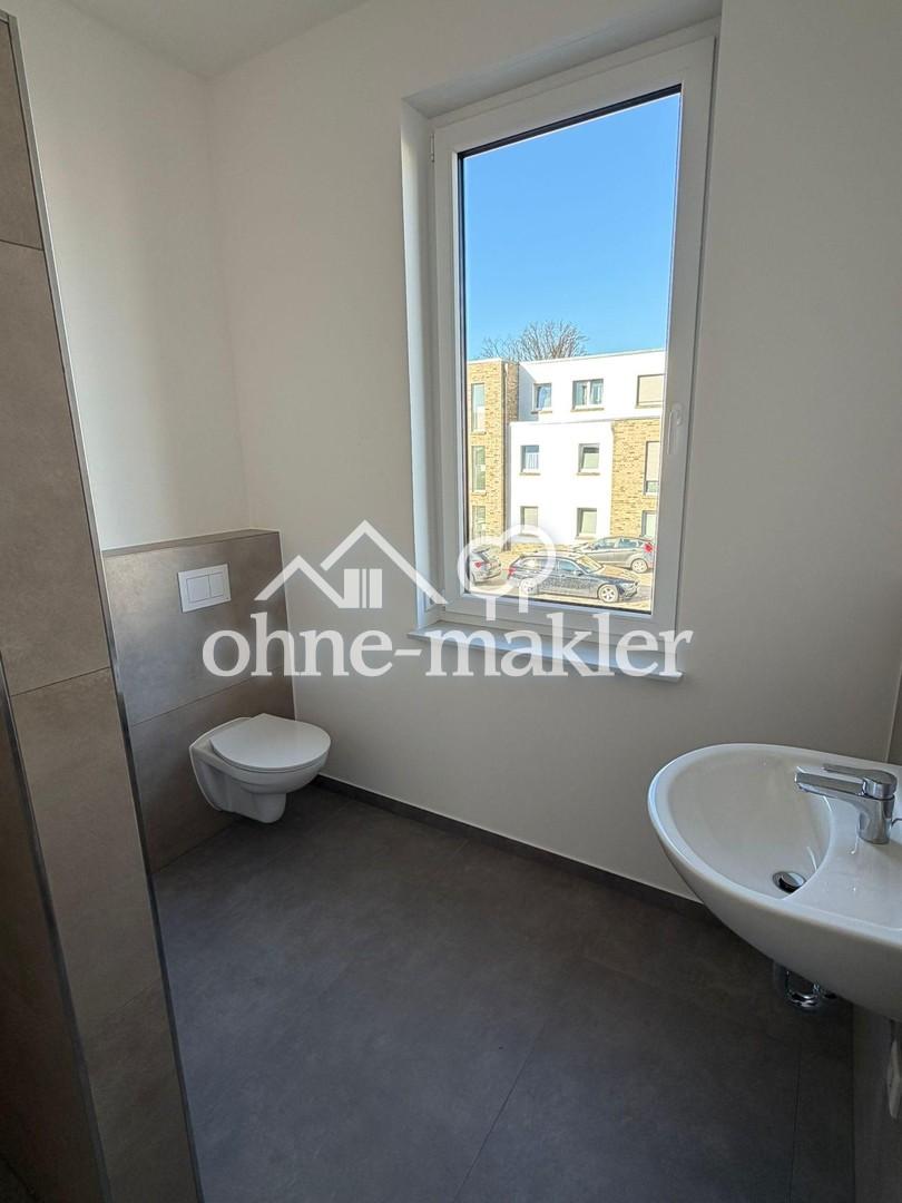 LETZTE Wohnung ERSTBEZUG! 4-Zimmer-Neubau mit Balkon- KfW-40 QNG, Fußbodenheizung & Top - Grundriss - Photo 3